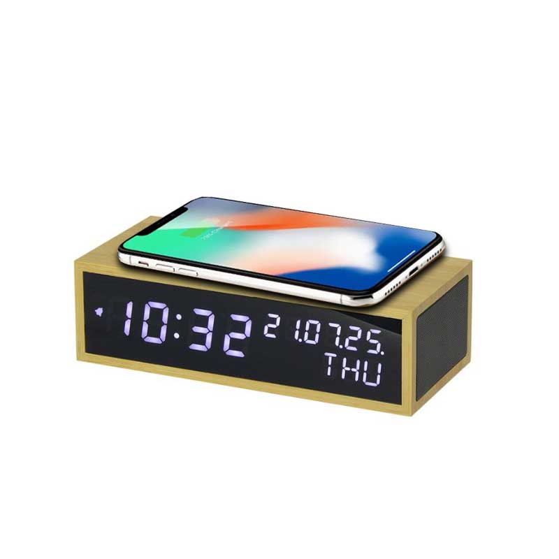 שעון שולחני מעוצב עם רמקול ומטען אלחוטי לסמארטפון