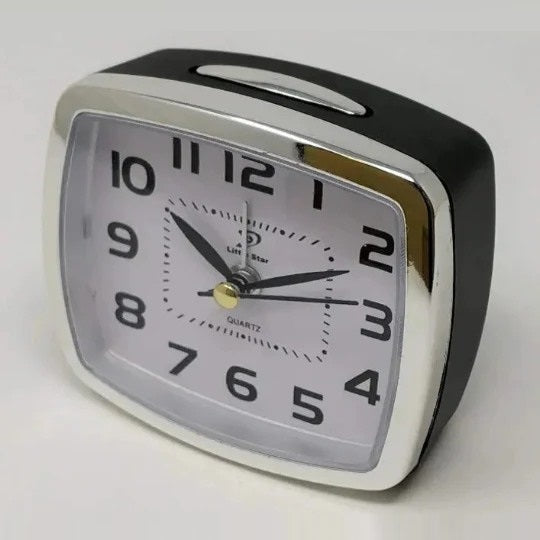 שעון מעורר קומפקטי עם נודניק ותאורה פנימית